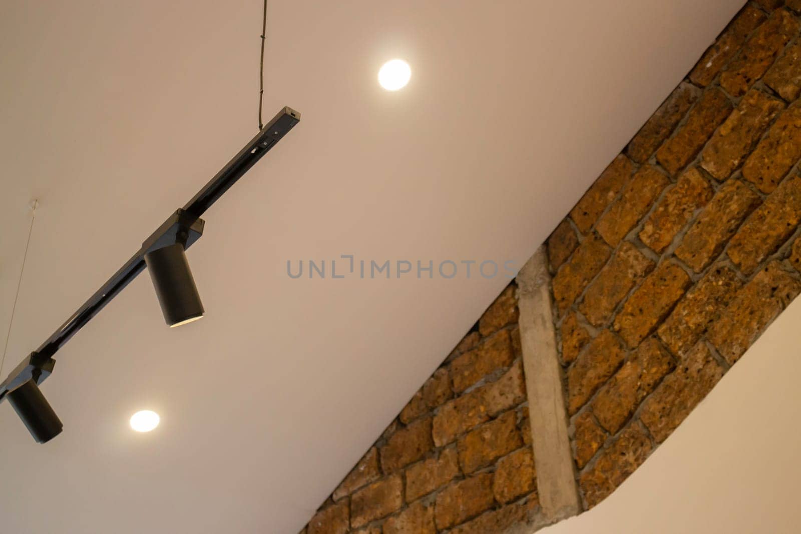 Room interior coffee shop with comfortable furniture, stock photo