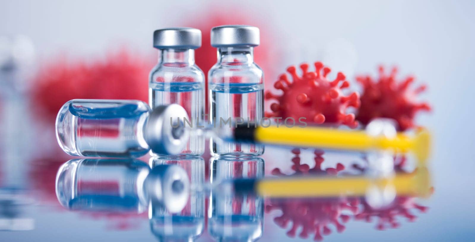 Close up medical syringe with a vaccine
