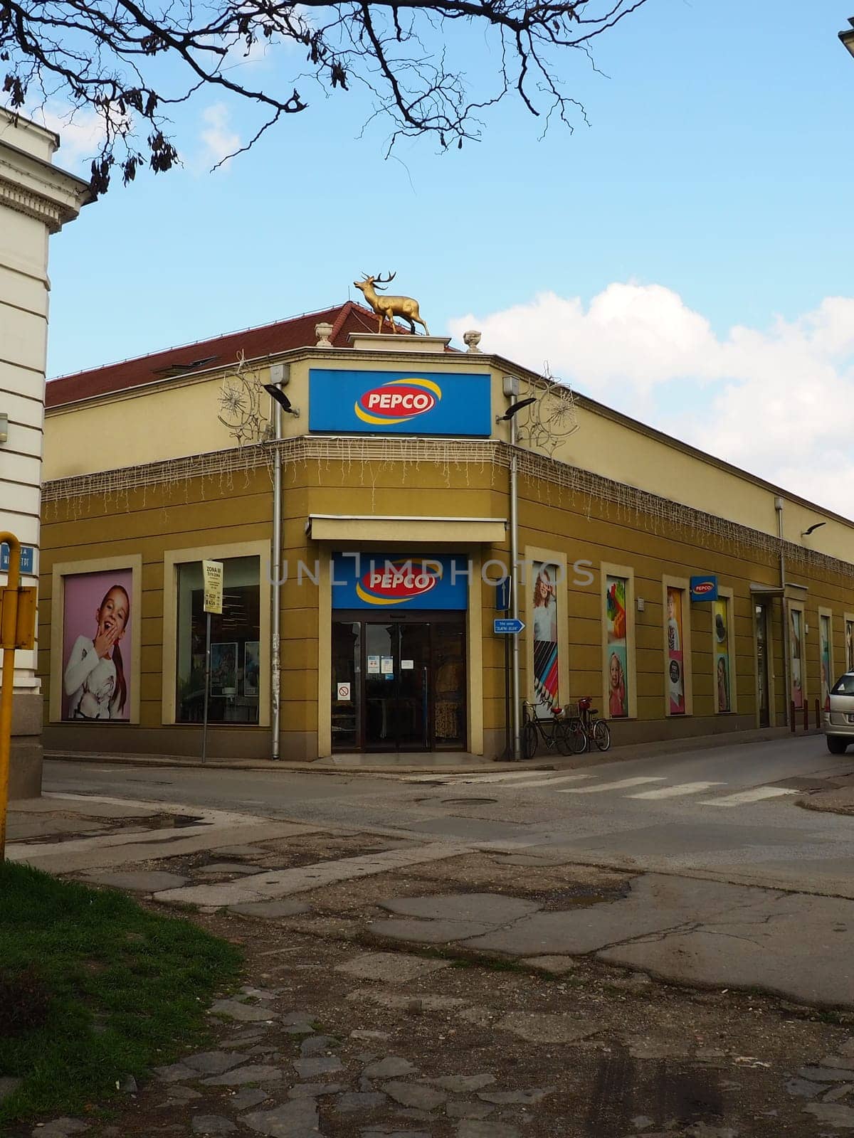 Sremska Mitrovica, Serbia, March 16 2023 A signboard with a name and logo of network stores Pepco above an entrance to a shop. Pepko banner. Women's shop with economical prices. Pepco chain in Serbia.