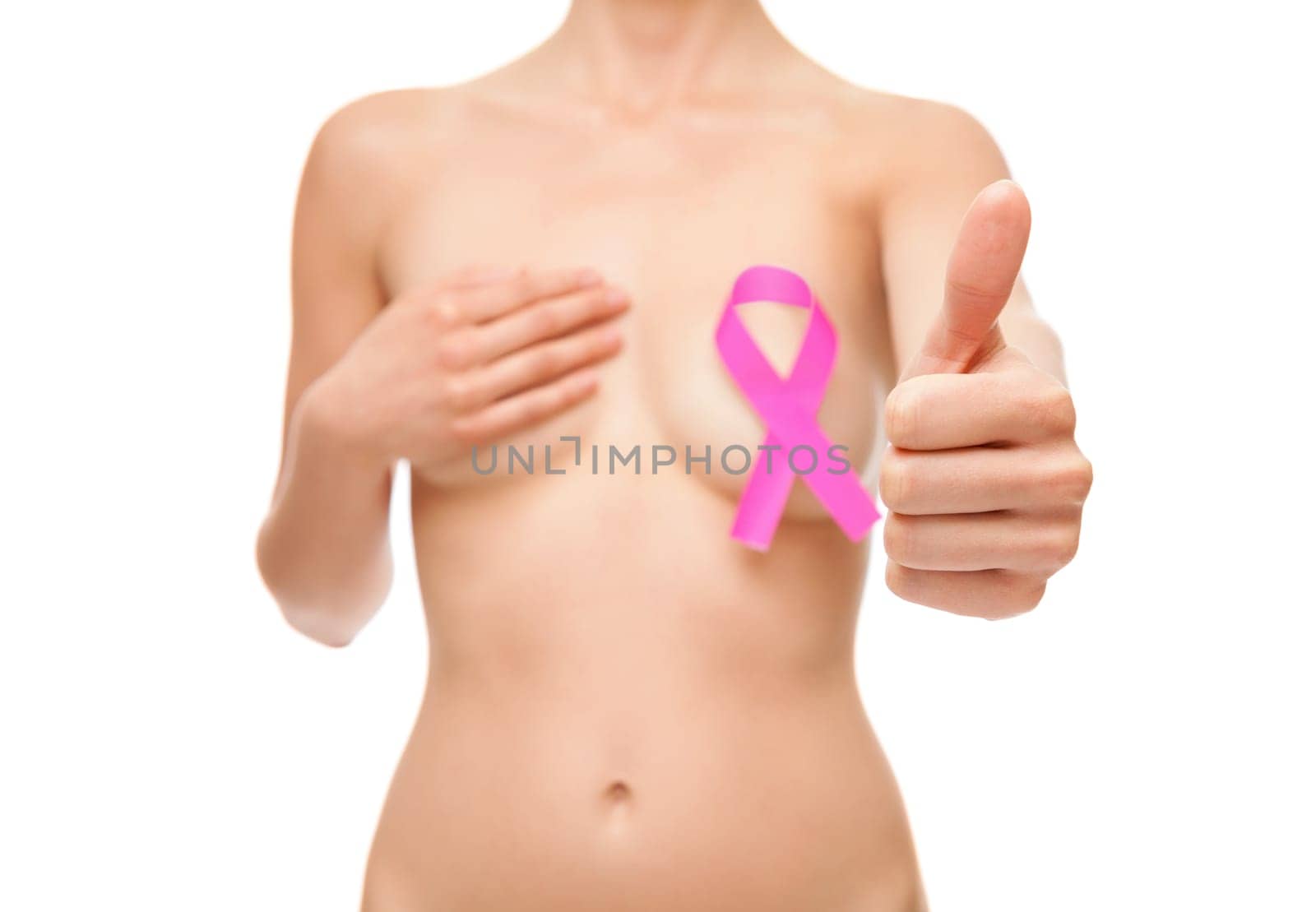 Woman with a pink breast cancer awareness ribbon