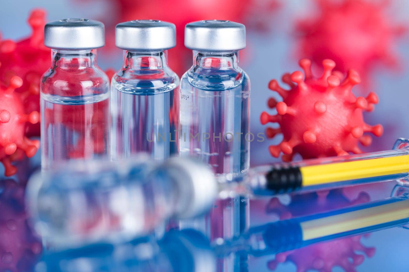 Close up medical syringe with a vaccine