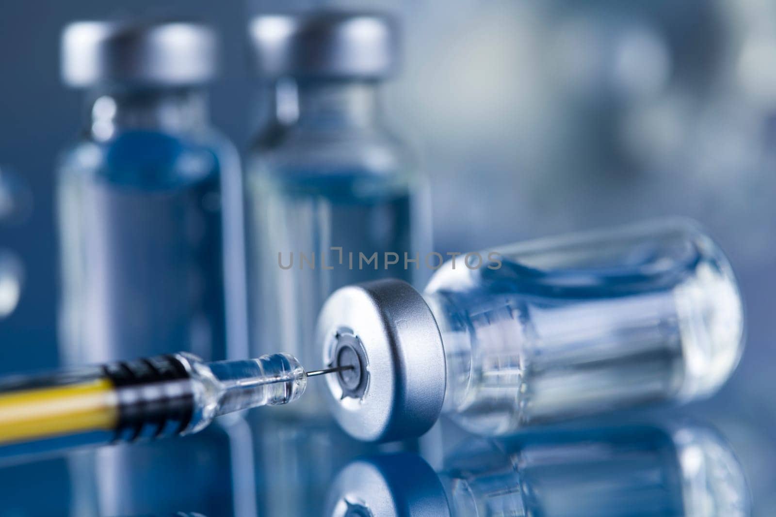 Close up medical syringe with a vaccine