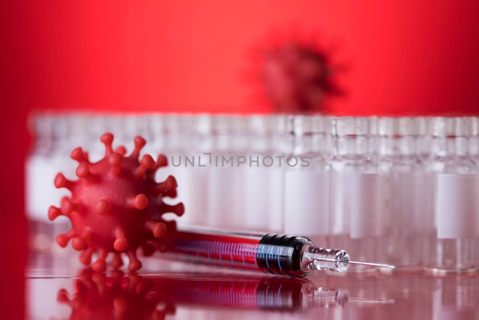 Close up medical syringe with a vaccine