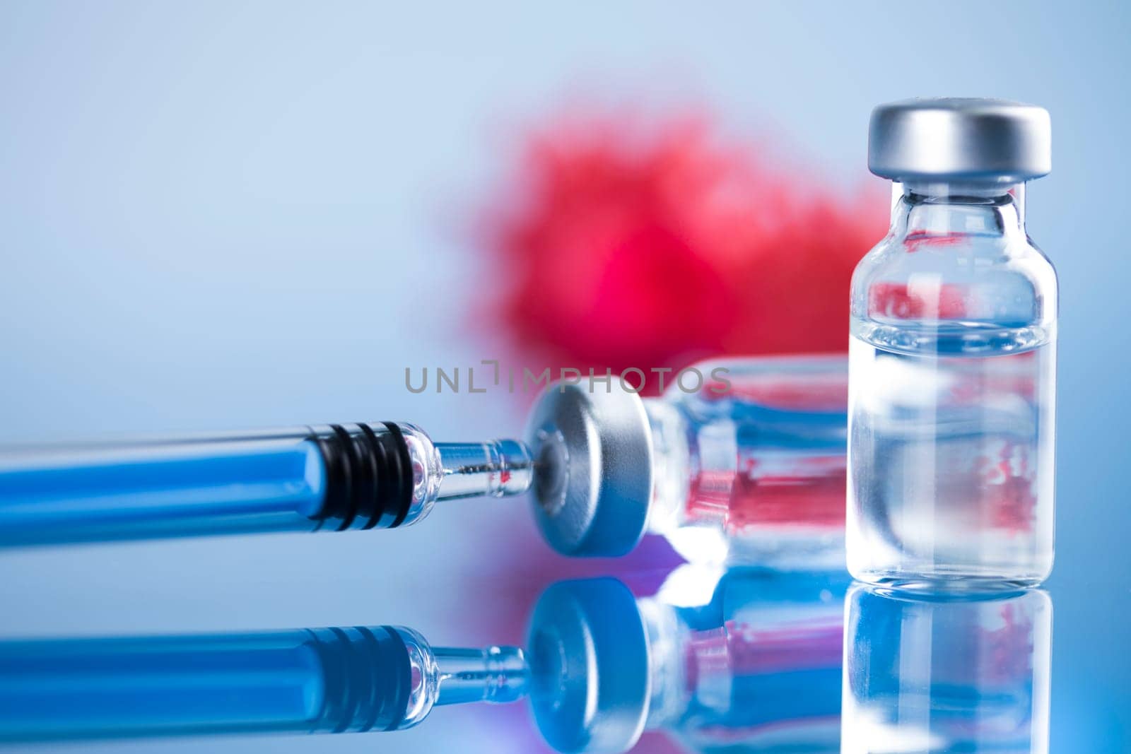Close up medical syringe with a vaccine