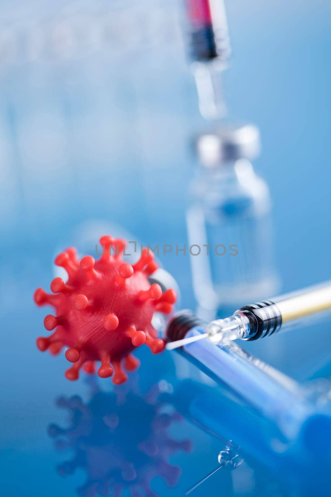 Close up medical syringe with a vaccine