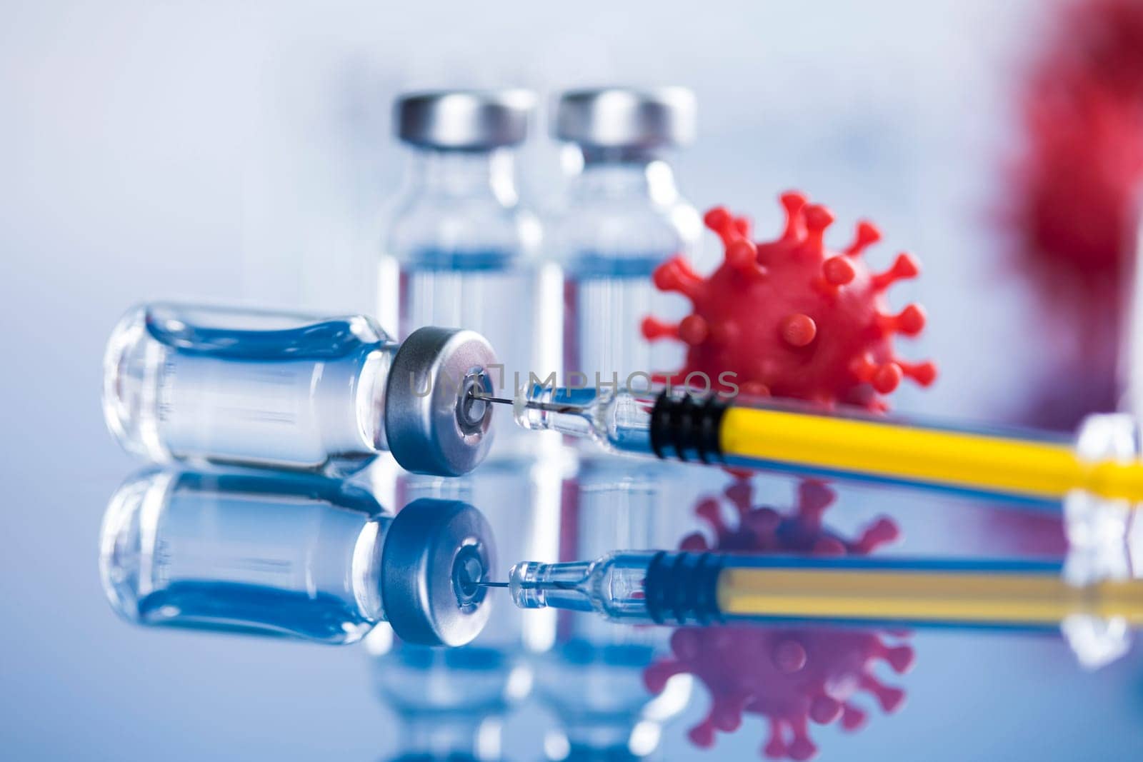 Close up medical syringe with a vaccine