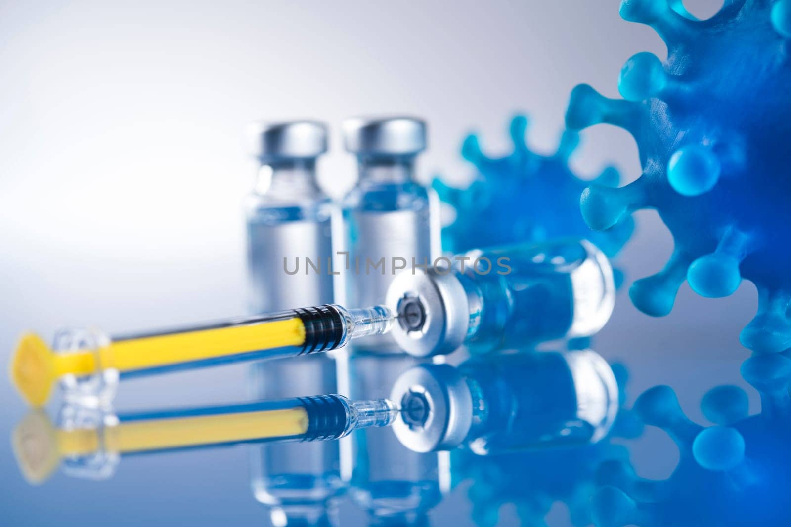Close up medical syringe with a vaccine