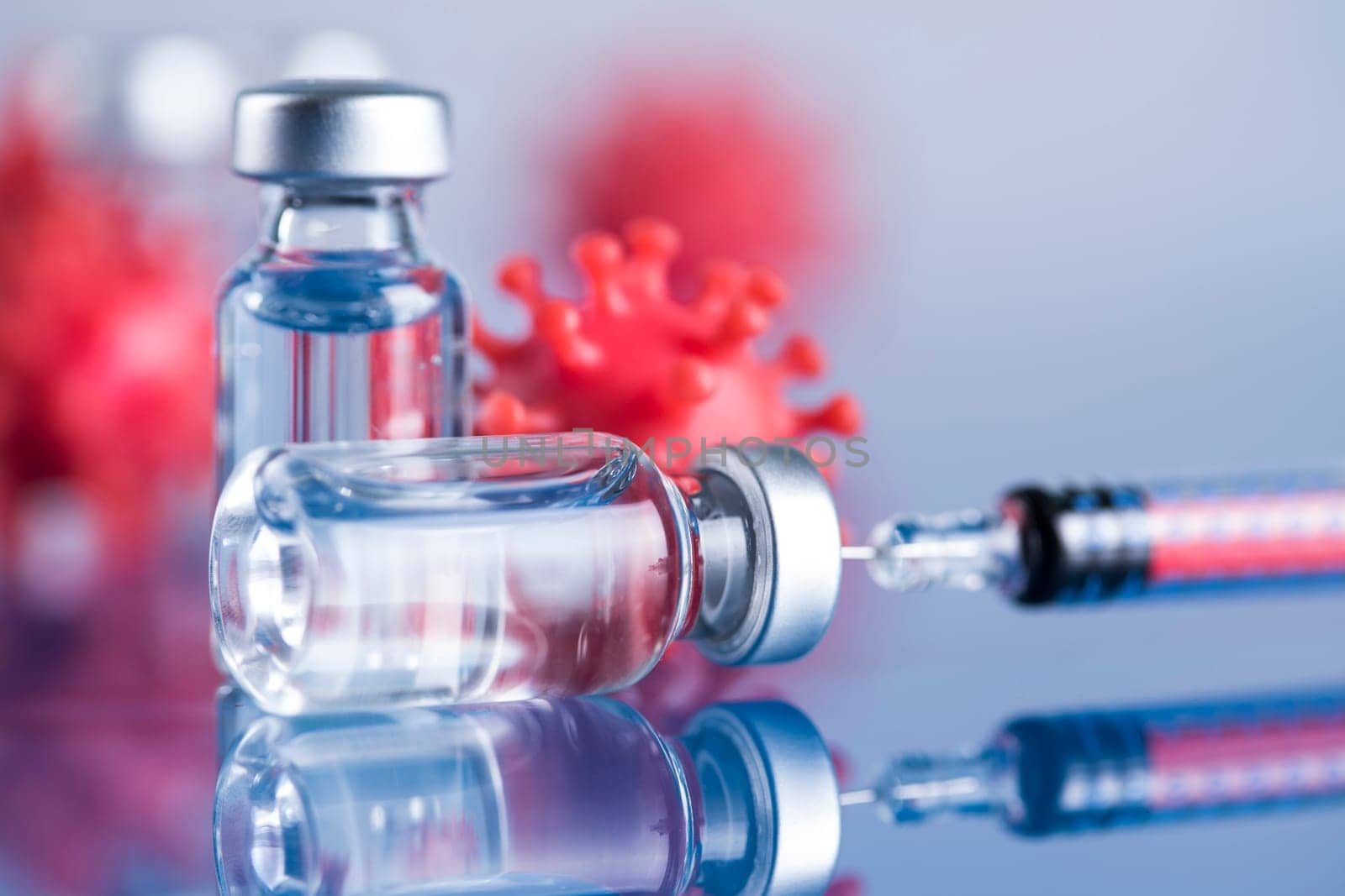 Close up medical syringe with a vaccine