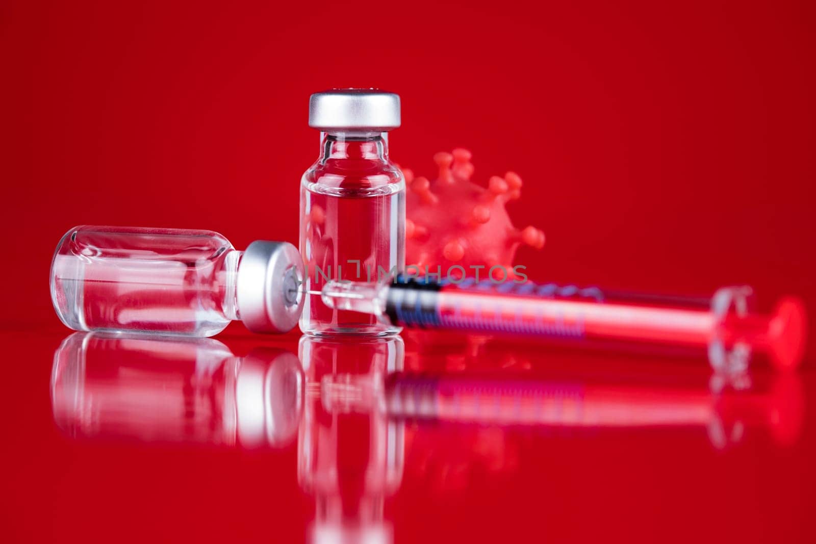 Close up medical syringe with a vaccine