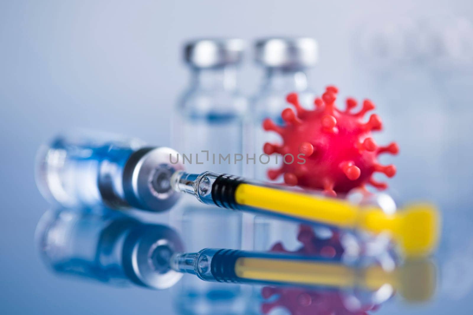 Close up medical syringe with a vaccine