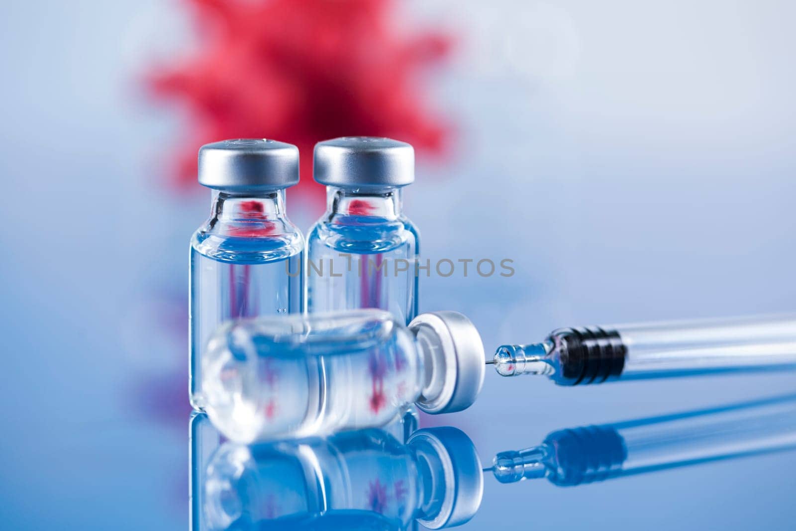 Close up medical syringe with a vaccine