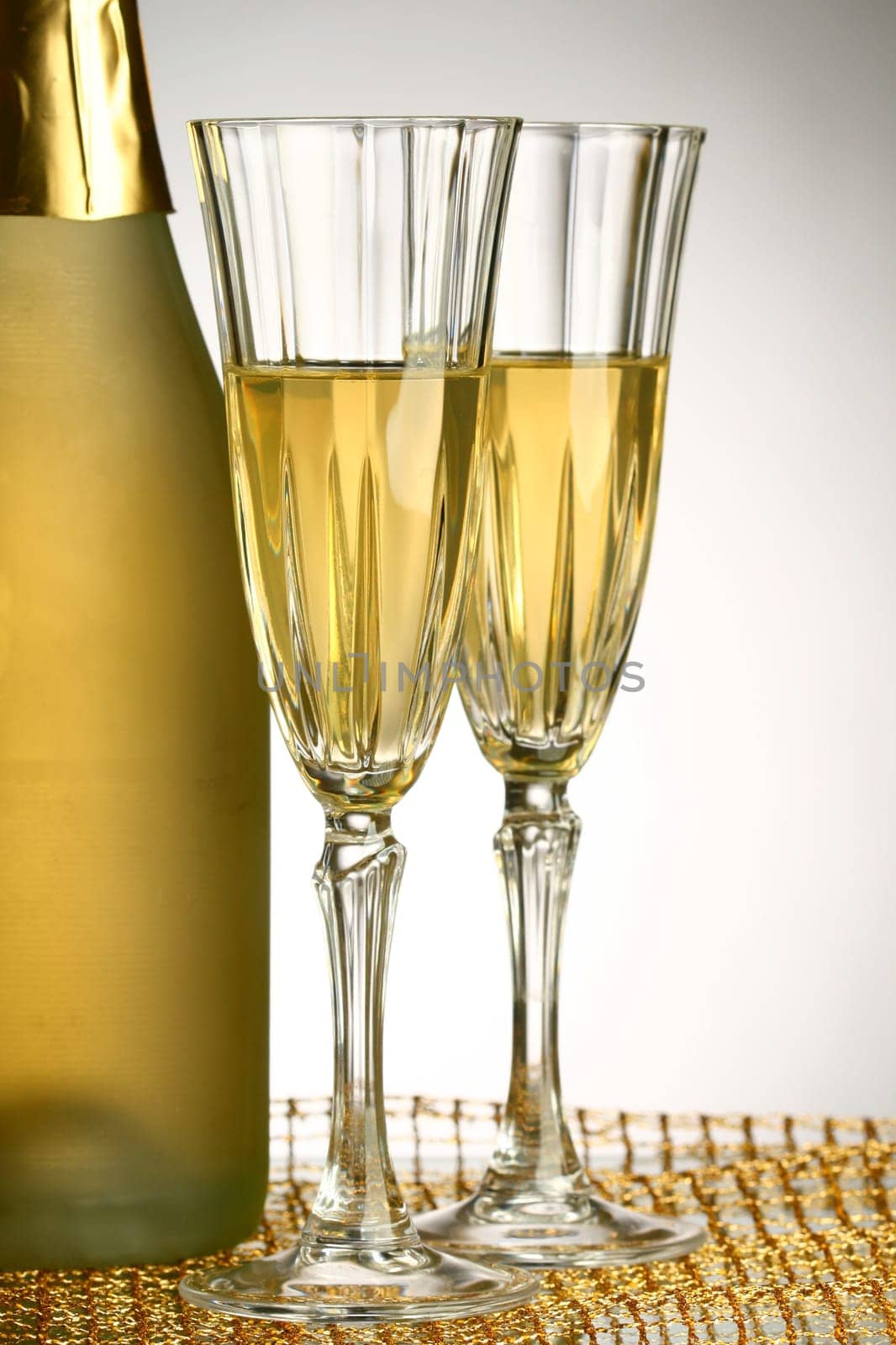 holiday card golden champagne and gift