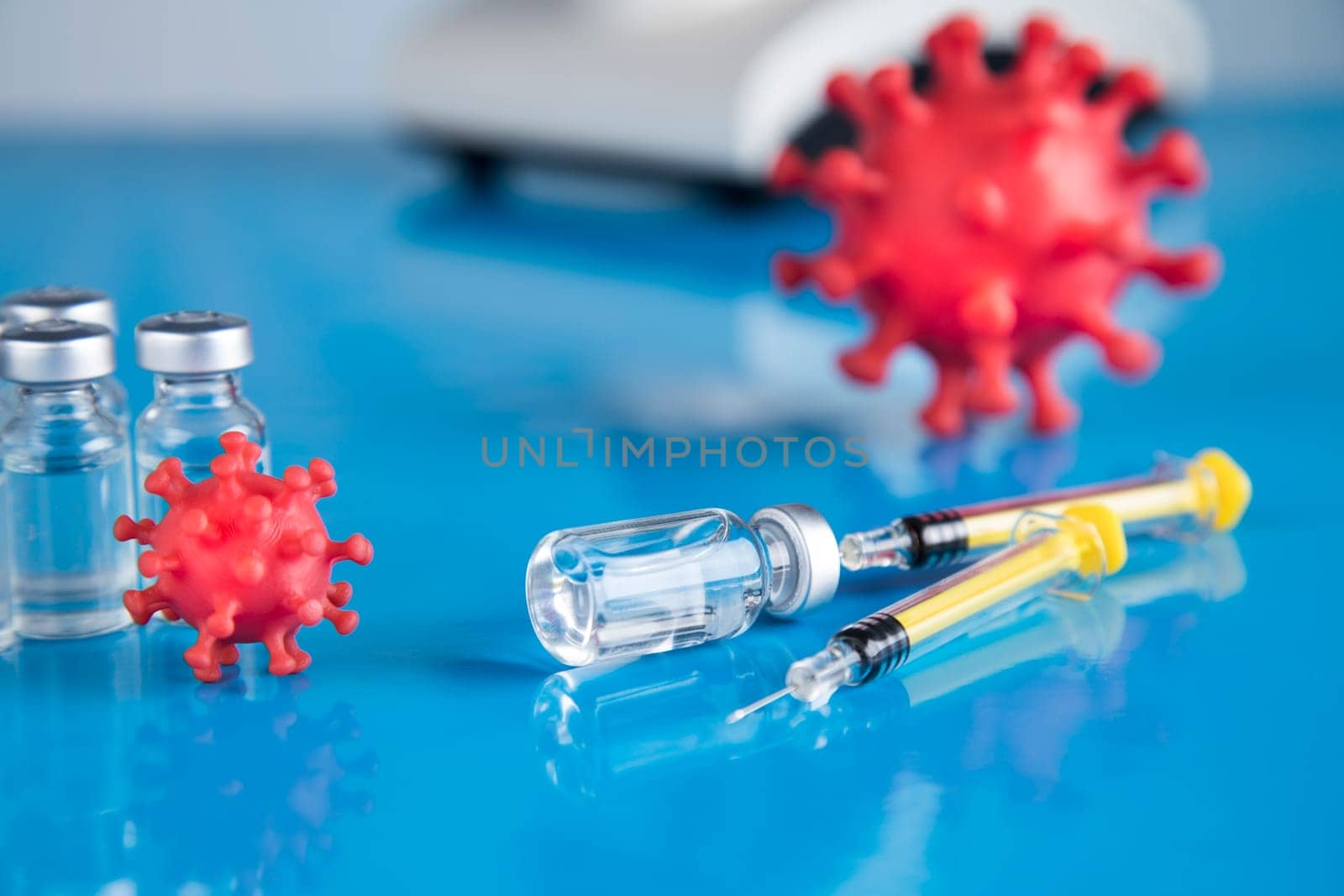 Close up medical syringe with a vaccine