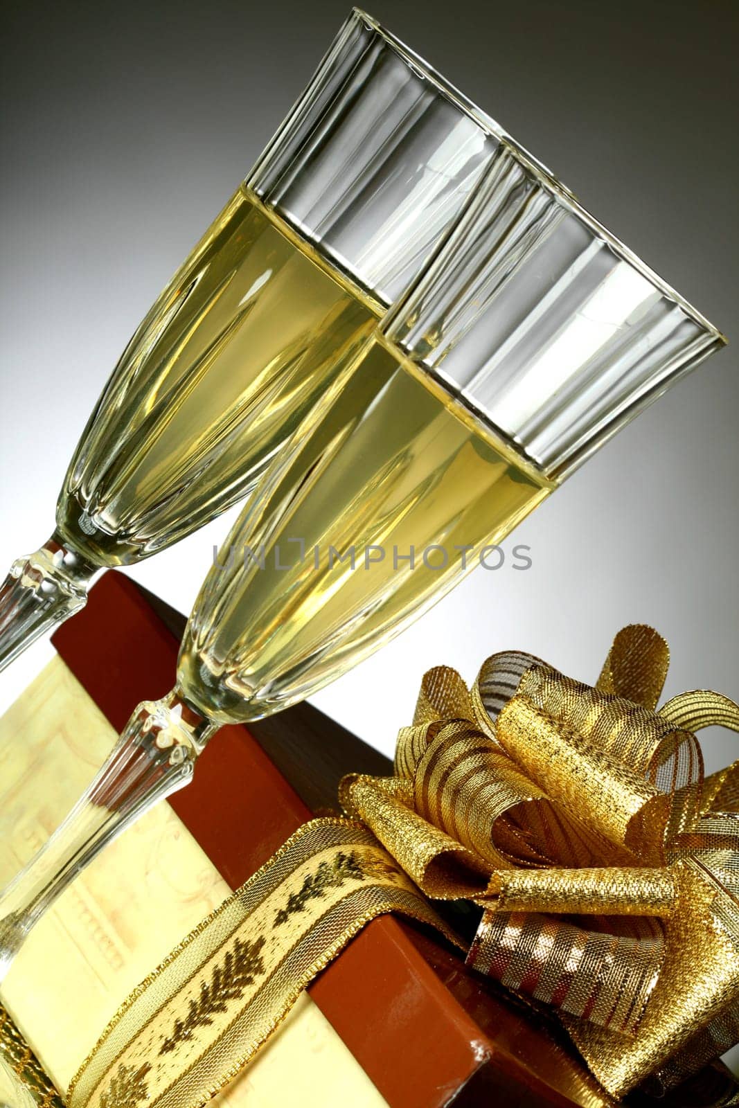 holiday card golden champagne and gift