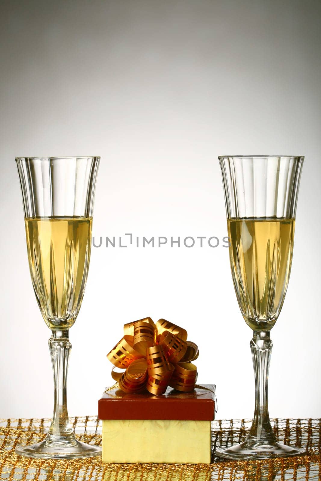 holiday card golden champagne and gift