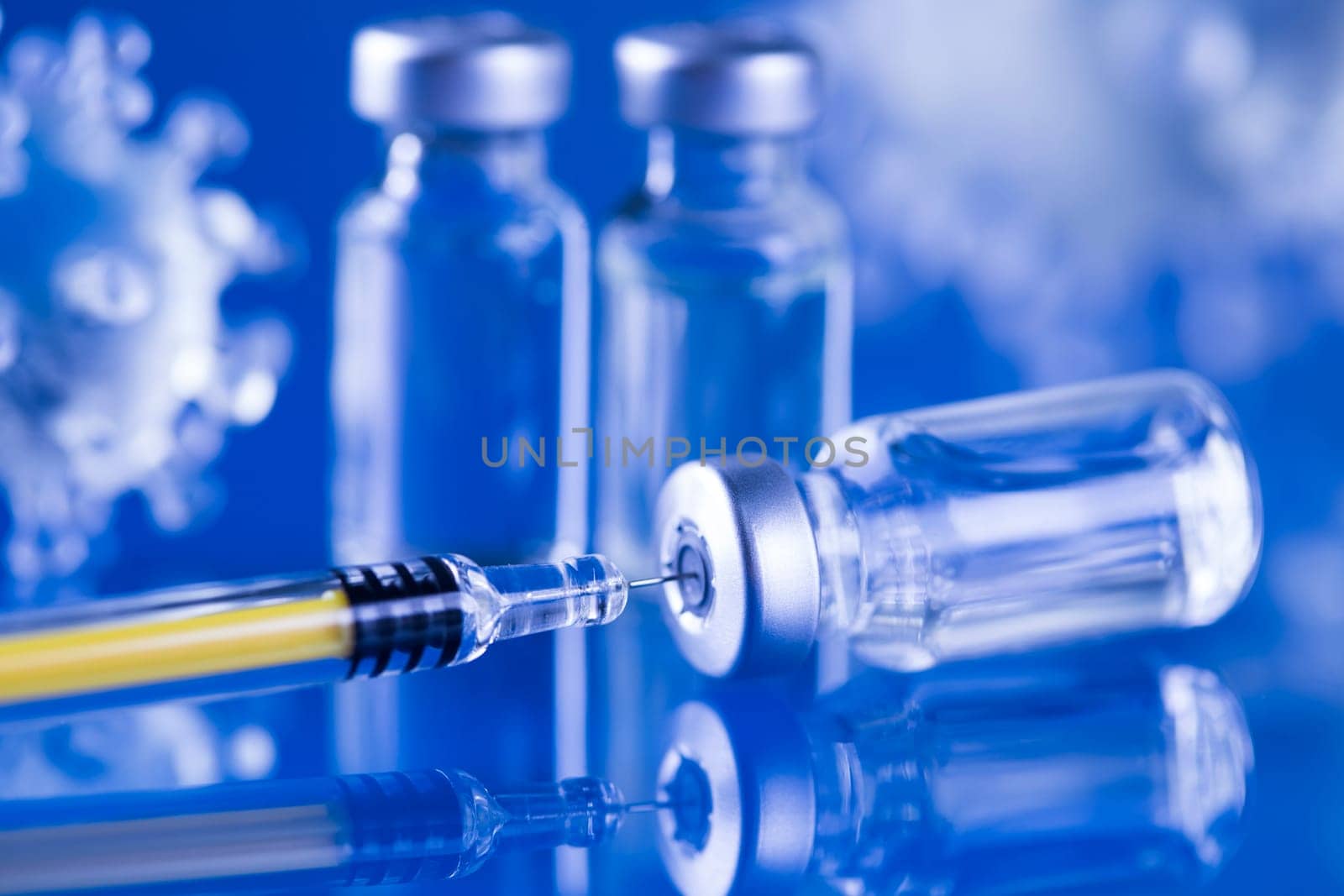 Close up medical syringe with a vaccine