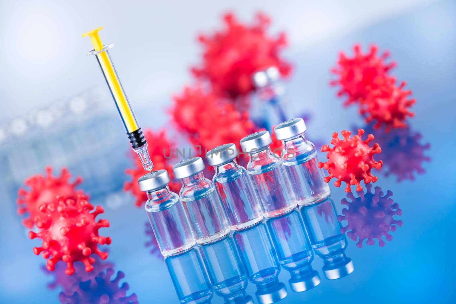 Close up medical syringe with a vaccine