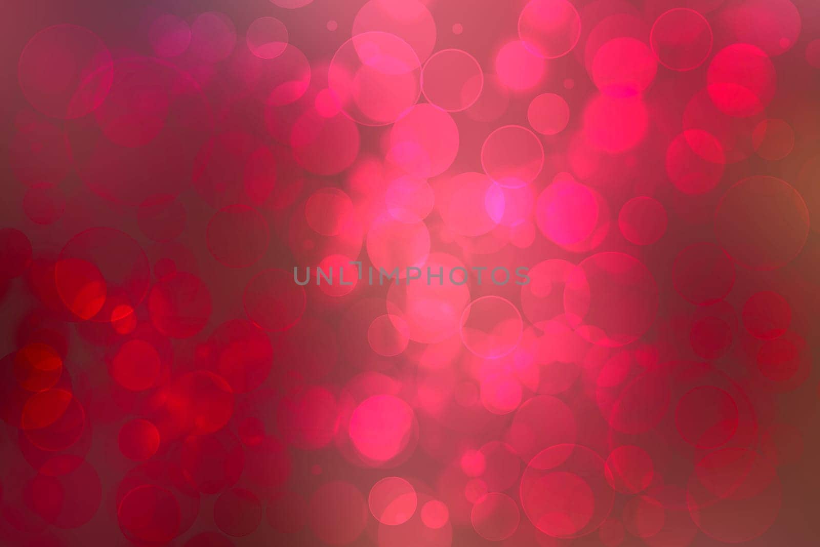 Abstract festive blurred red pink magenta background with light pink bokeh for wedding card or Valentine day.  Romantic textured backdrop with space for your design. Card concept.