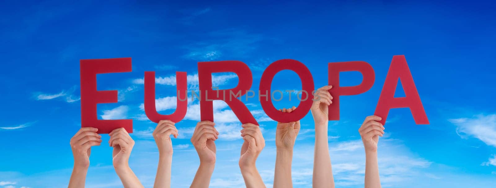 People Or Persons Hands Building German Word Europa Means Europe. Blue Sky As Background.
