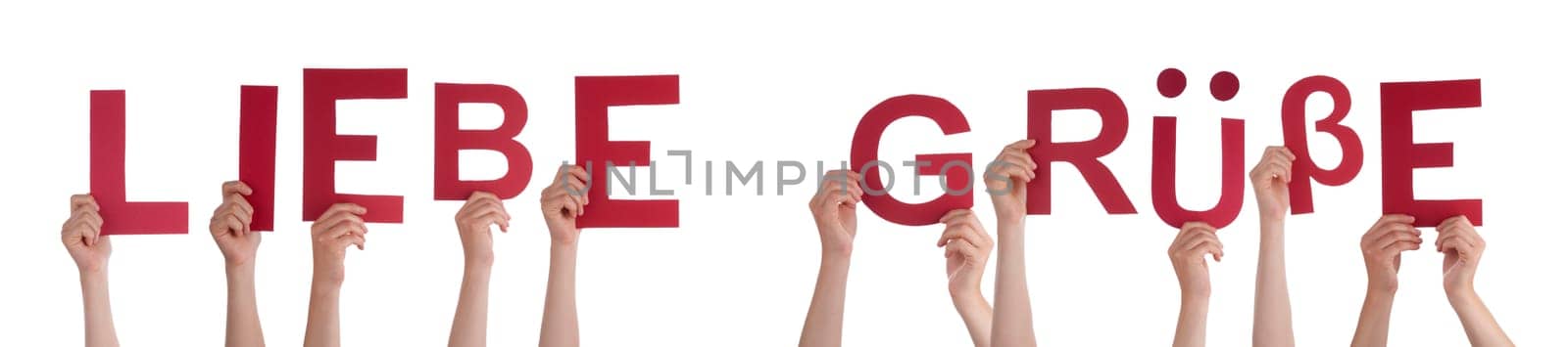 People Or Persons Hands Building German Word Liebe Gruesse Means Many Greetings. Isolated White Background.