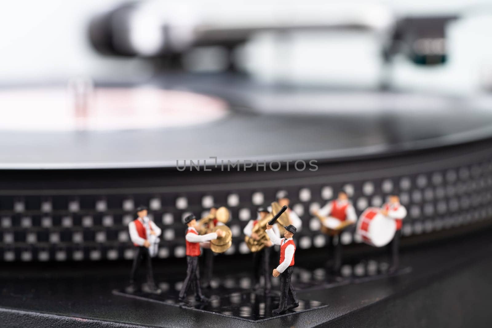 Miniature brass band and turntable background