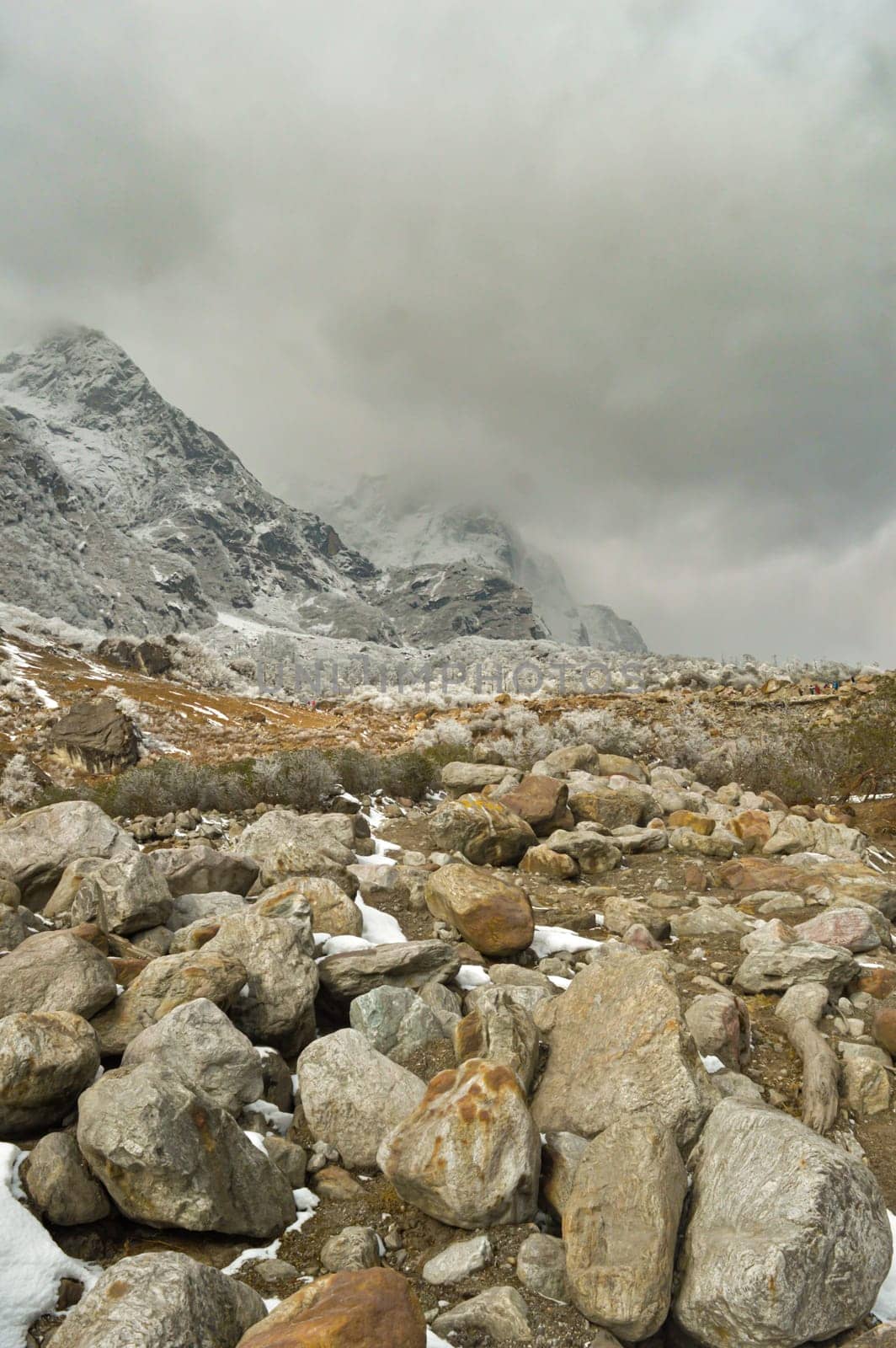 Rocky Mountain Boulder Rocks against foggy cloudy mountain background. Lachung Sikkim West Bengal India South Asia Pacific
