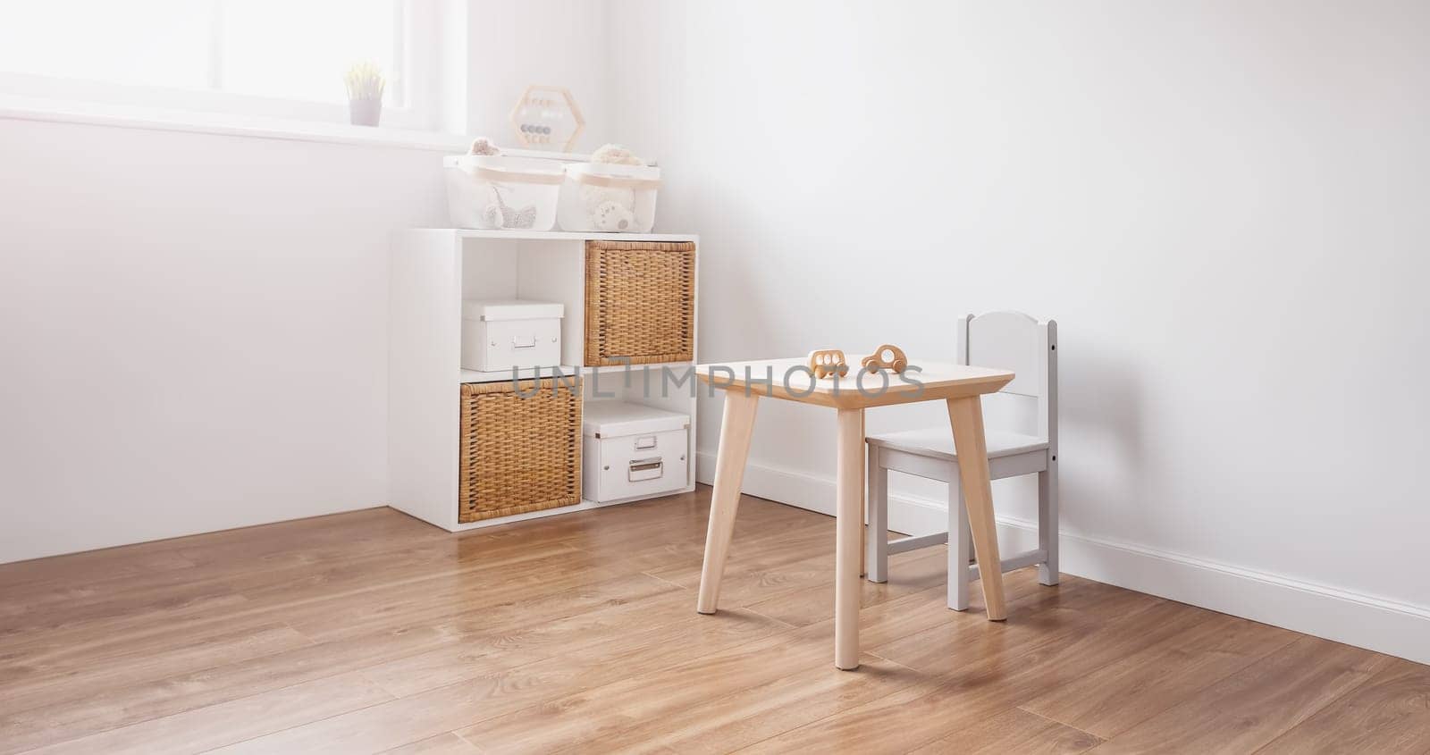 White childroom in pastel colors in scandinavian minimalist style. Empty playroom.
