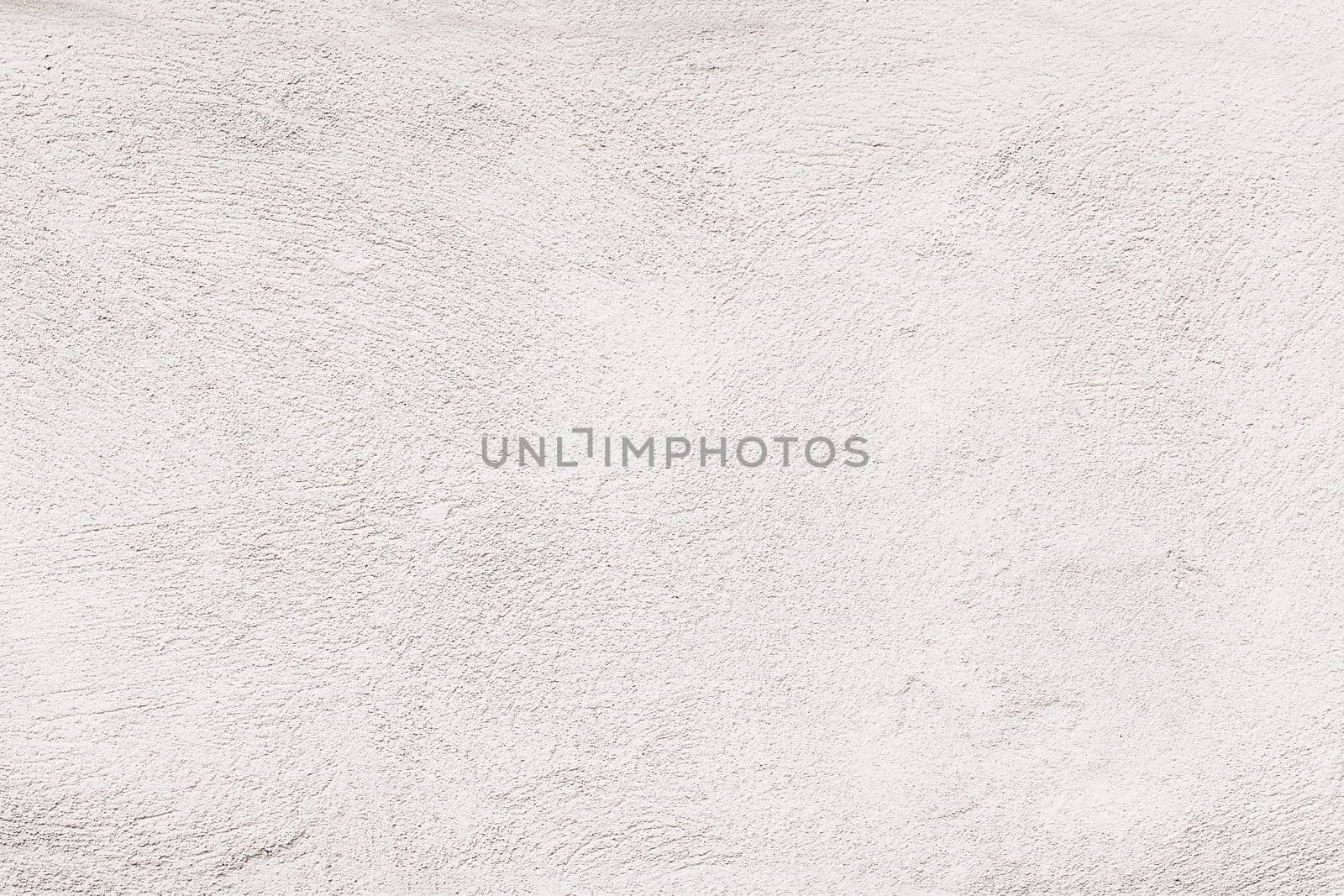 Empty concrete wall covering by white plaster. Concept as wallpaper and background.