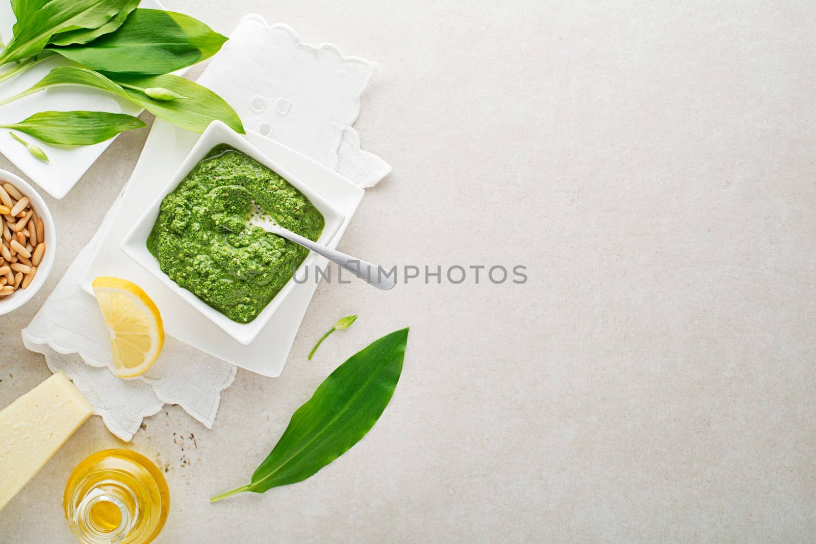 Making Fresh ramson or wild garlic pesto. Healthy spring food concept