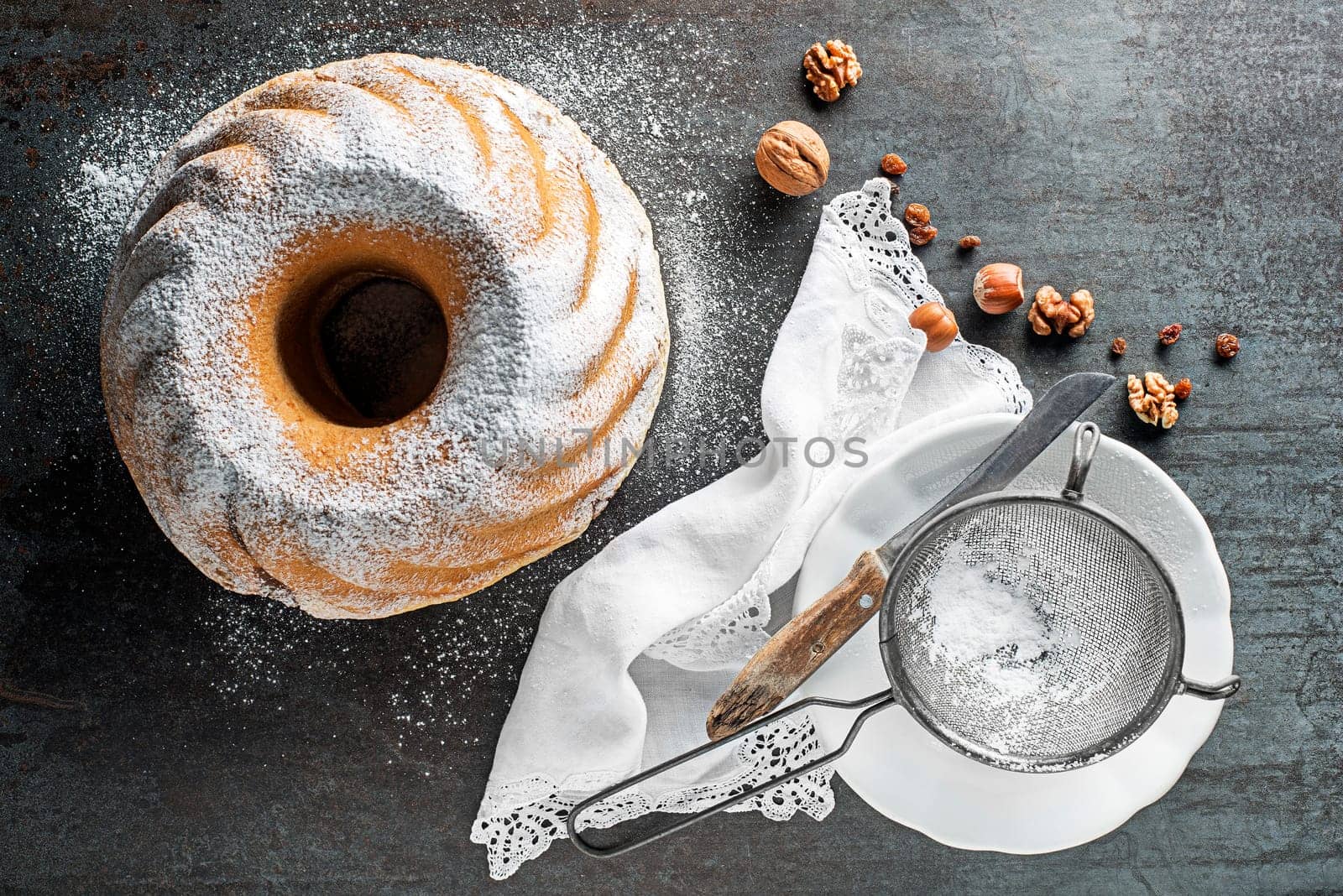 Potica, traditional Slovenian bread cake roll with walnuts. Sweet bread roll stuffed with walnuts and sprinkle with sugar