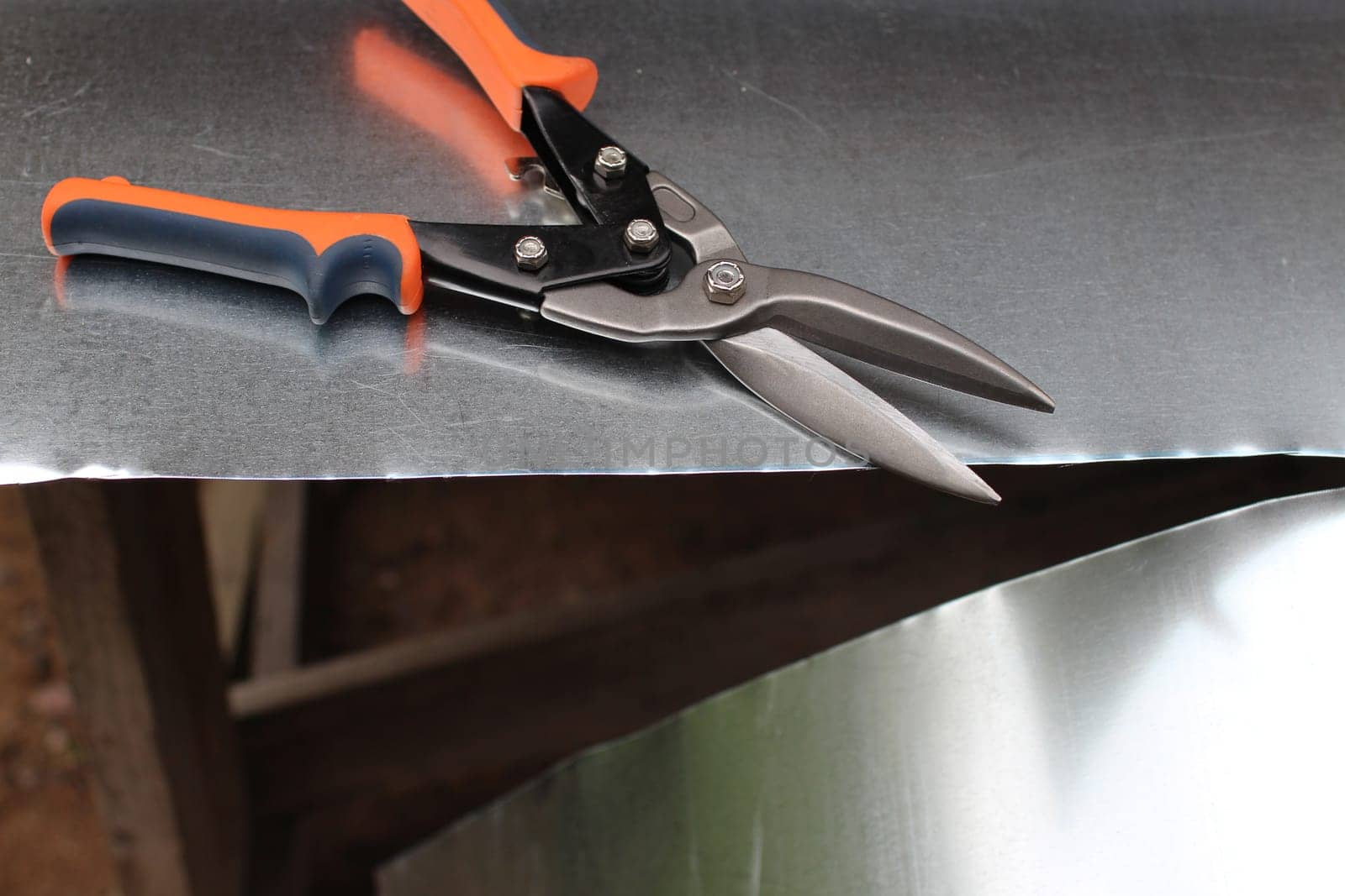 thin sheet of metal cut with metal