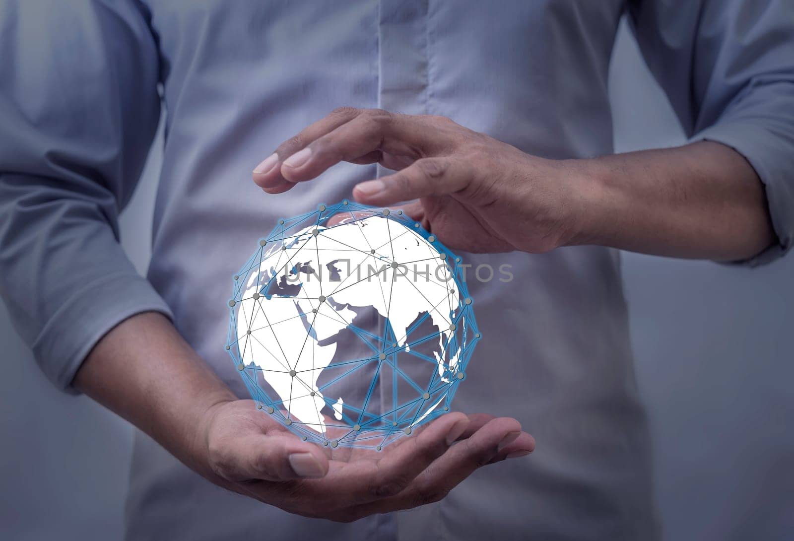 Global internet connection application and technology digital marketing, Financial and banking, Businessman holding globe on blurred background