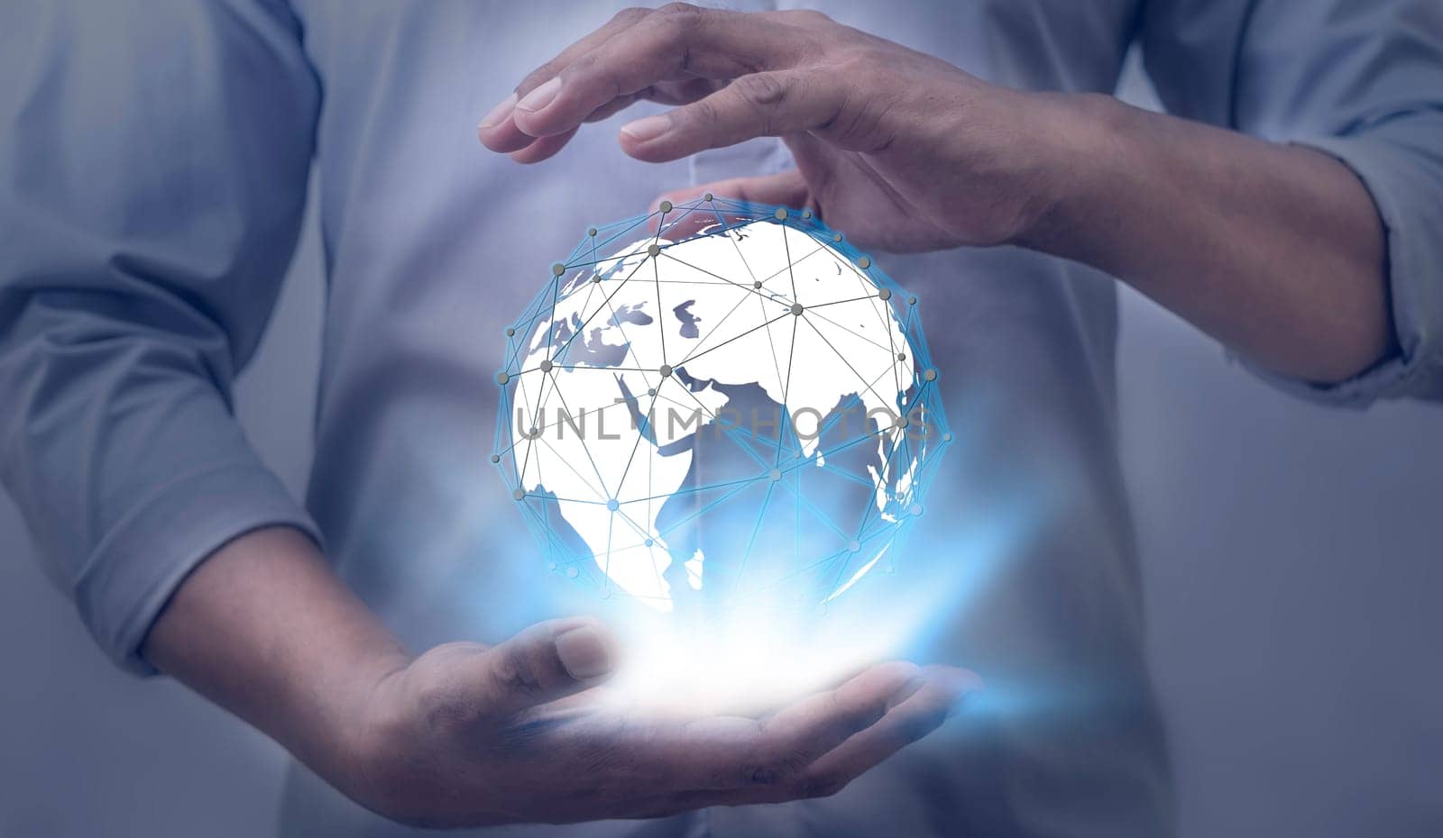 Global internet connection application and technology digital marketing, Financial and banking, Businessman holding globe on blurred background