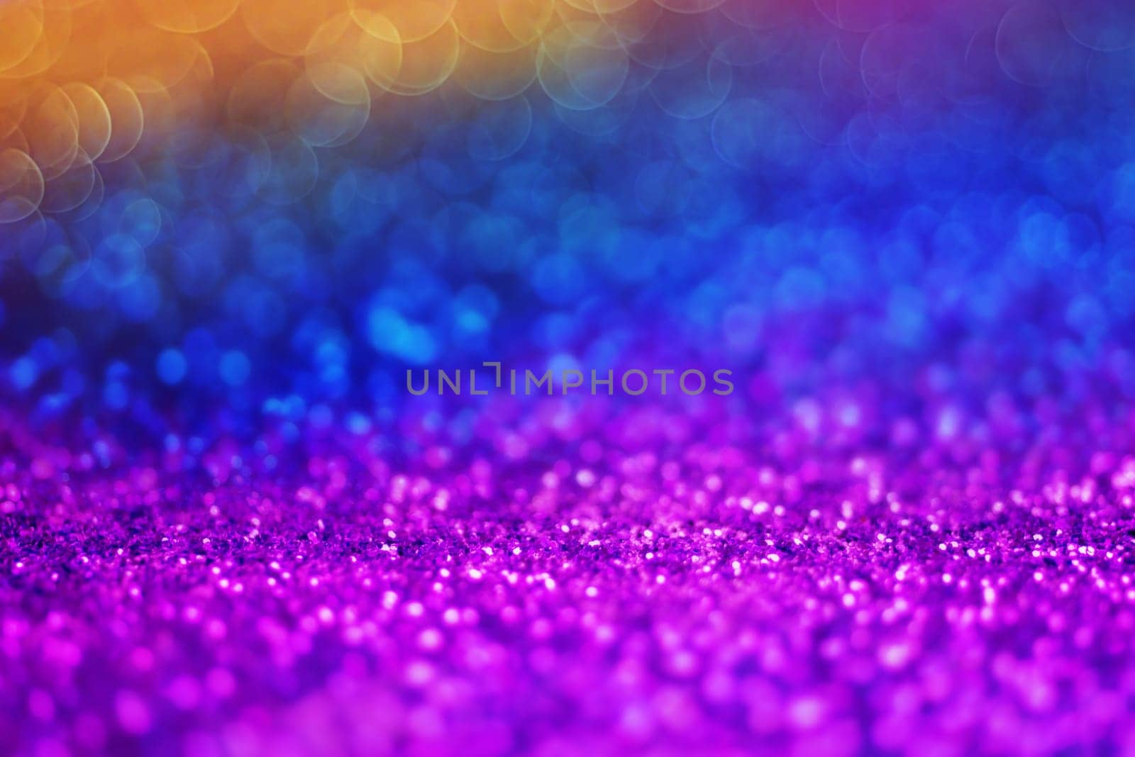 Glitter light abstract full color bokeh christmas light blurred background