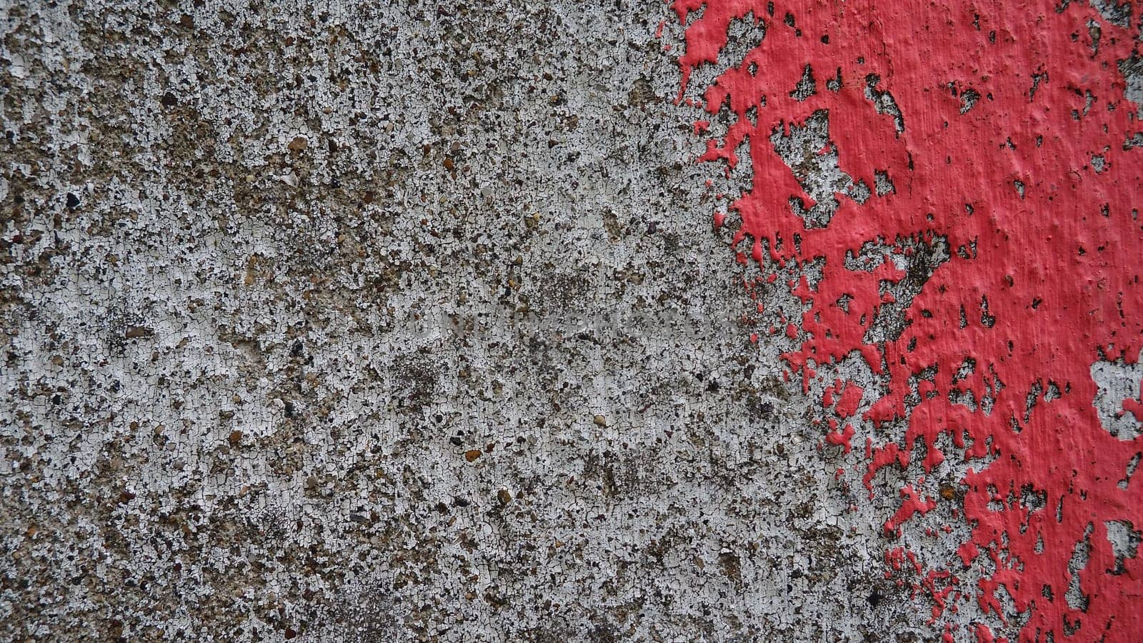 Dirty concrete with a stroke of pink paint