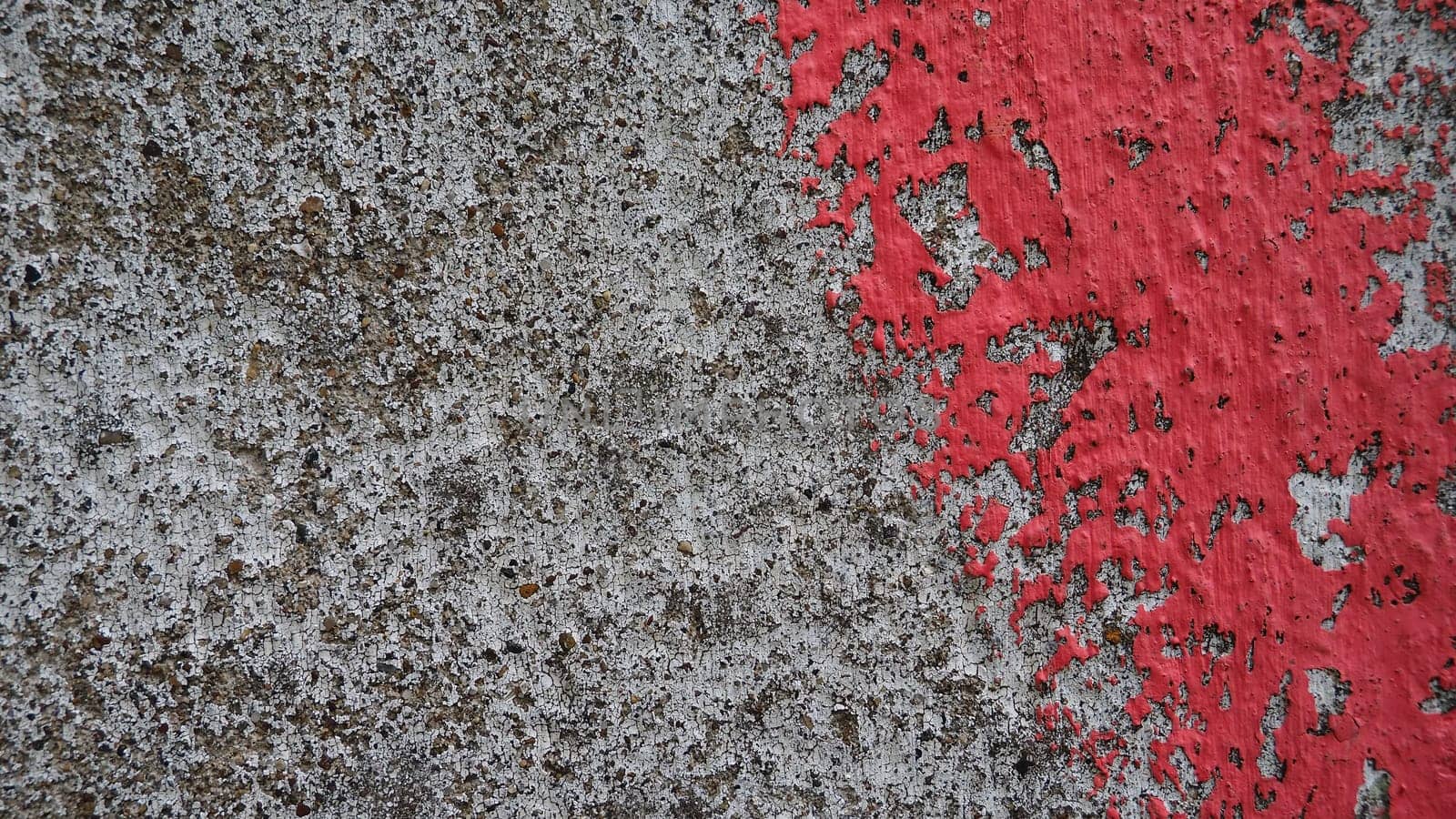 Dirty concrete with a stroke of pink paint