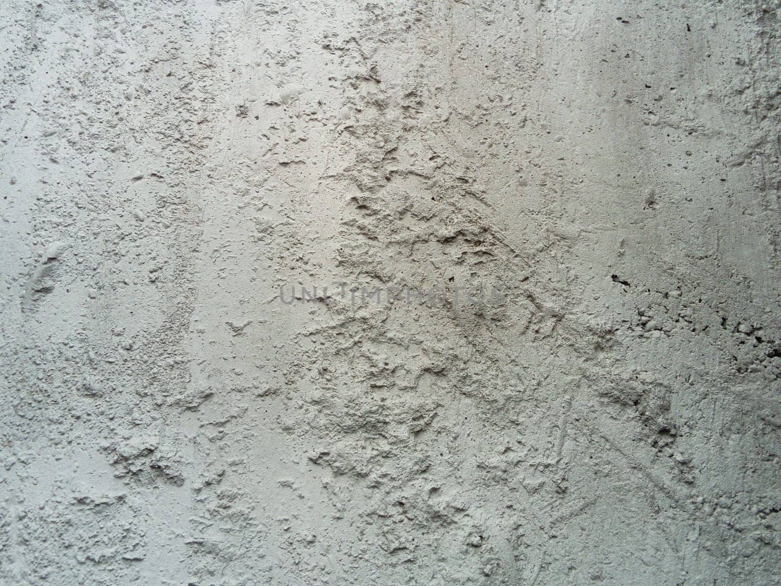cement board background and texture. Unevenly set cement. Rough gray concrete wall