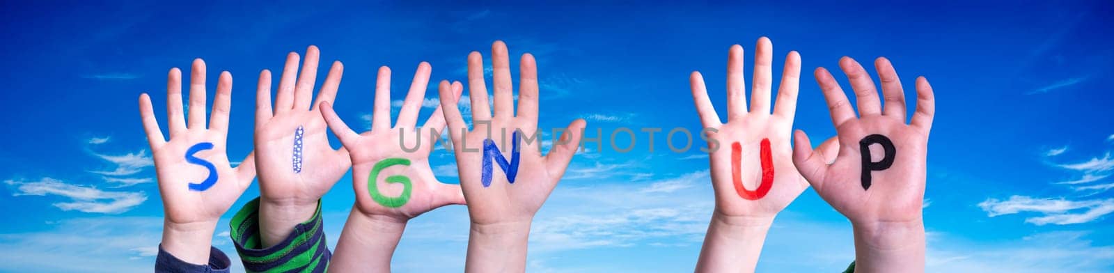 Children Hands Building Colorful English Word Sign Up. Blue Sky As Background