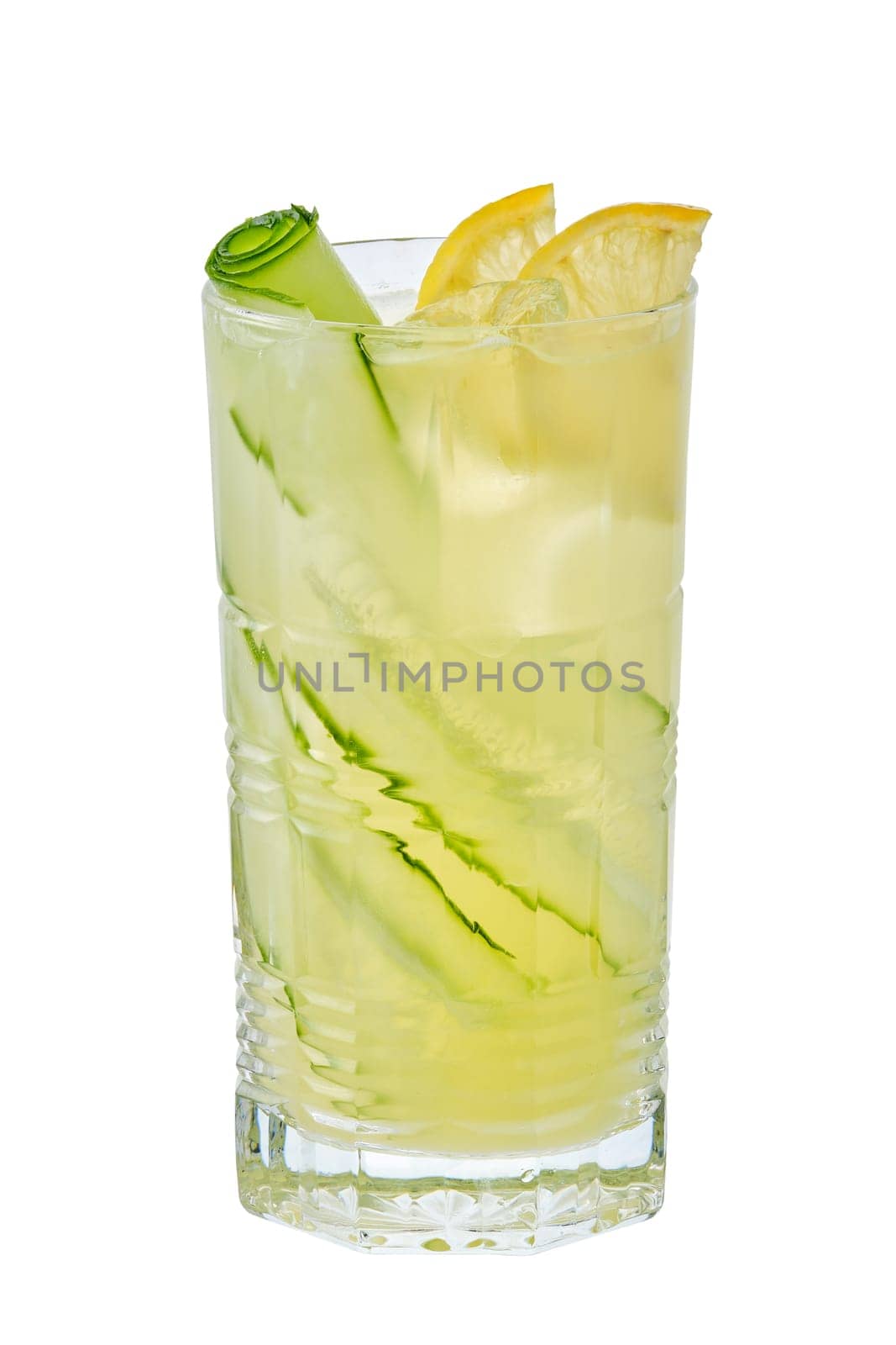 Tall glass of cold lemon and cucumber lemonade isolated on white background