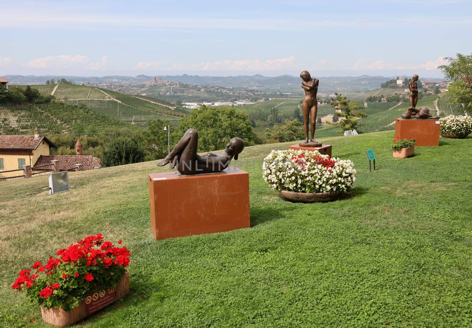 Grinzane Cavour, Italy - Sept 8, 2022: Open air art installation with sculptures by Sergio Unia in the garden of Grinzane Cavour Castle. Piedmont, Italy