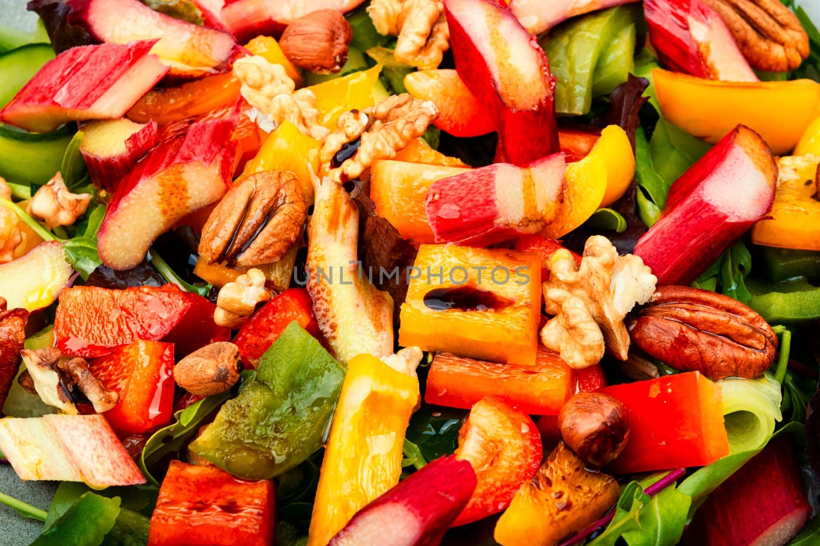 Useful spring salad of rhubarb, bell pepper, herbs and nuts. Space for text