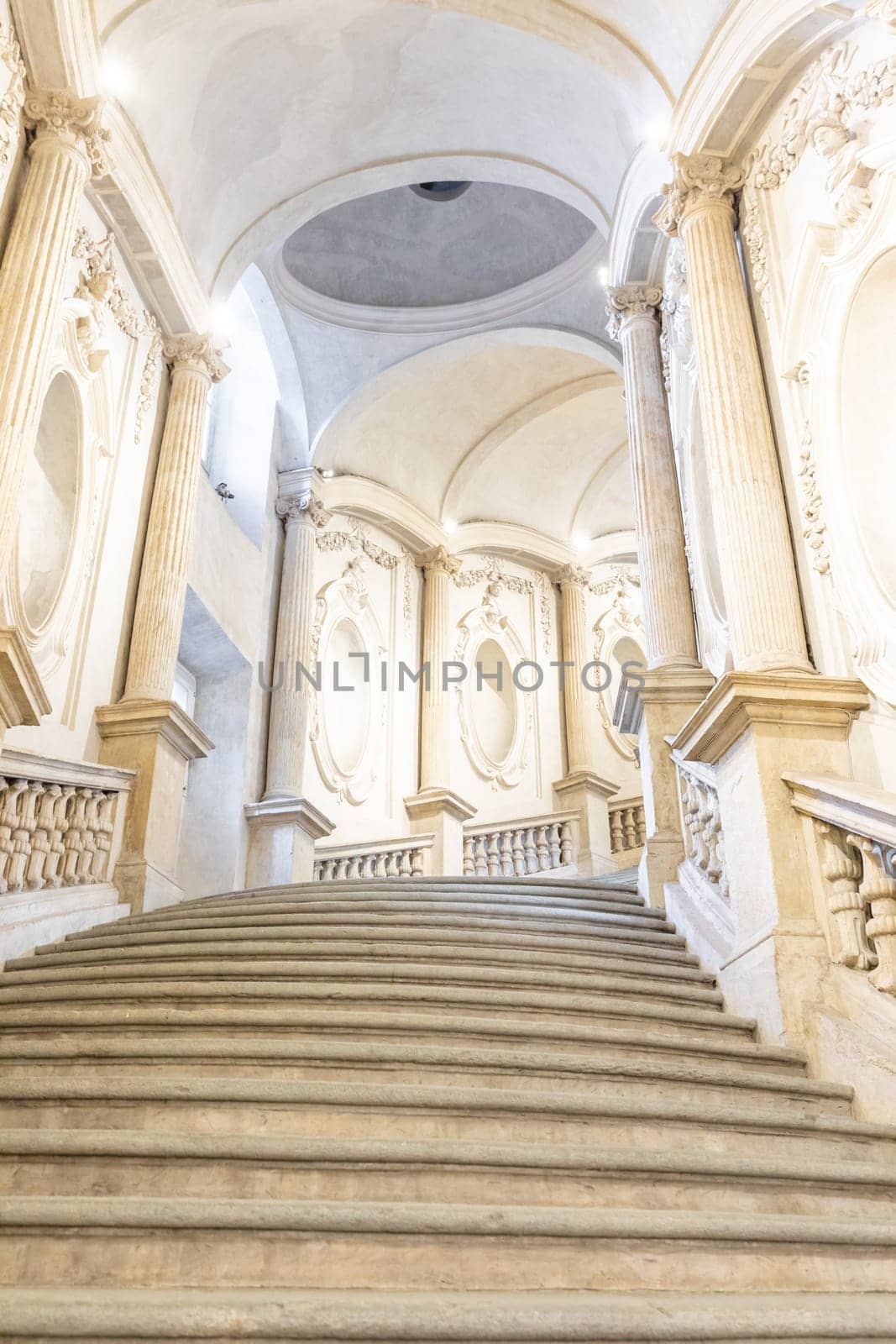 Turin, Italy - Circa January 2022: luxury marble staircase. Antique architecture interior design