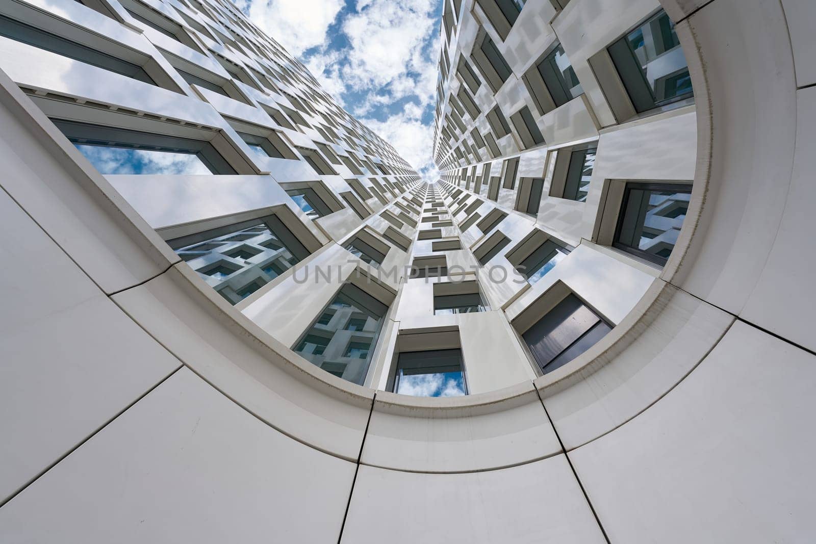 Looking up, at the facade of a high-rise building in downtown Berlin