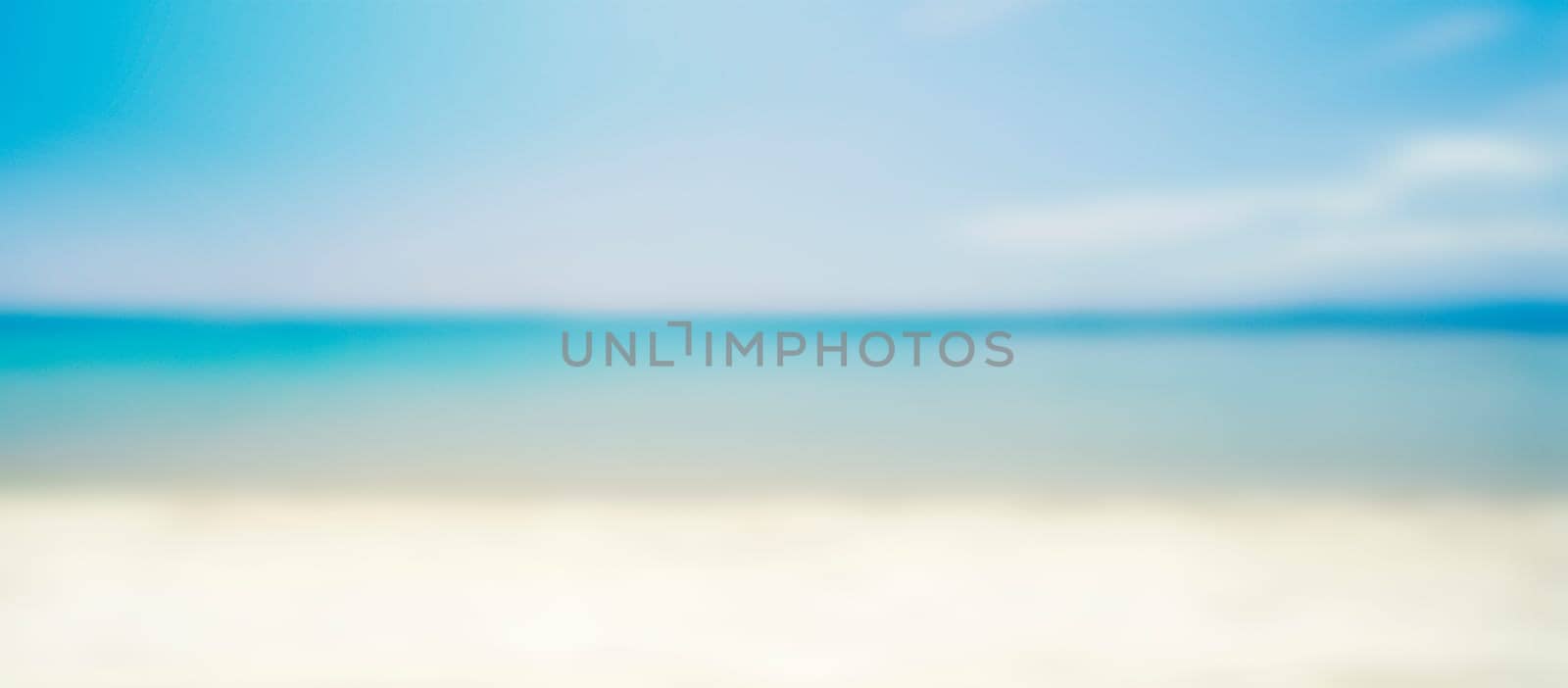 Tropical island sandy beach design background. Blurred abstract resort landscape with sun and sea. Holiday and traveling concept. Soft and light image.