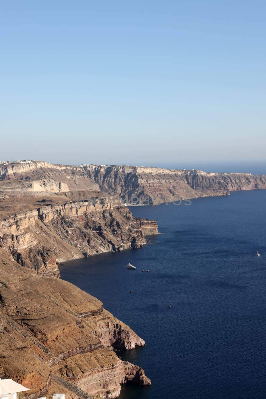 Panoramic view of the Santorini caldera cliffs from the Imerovigli village on Santorini island, Greece