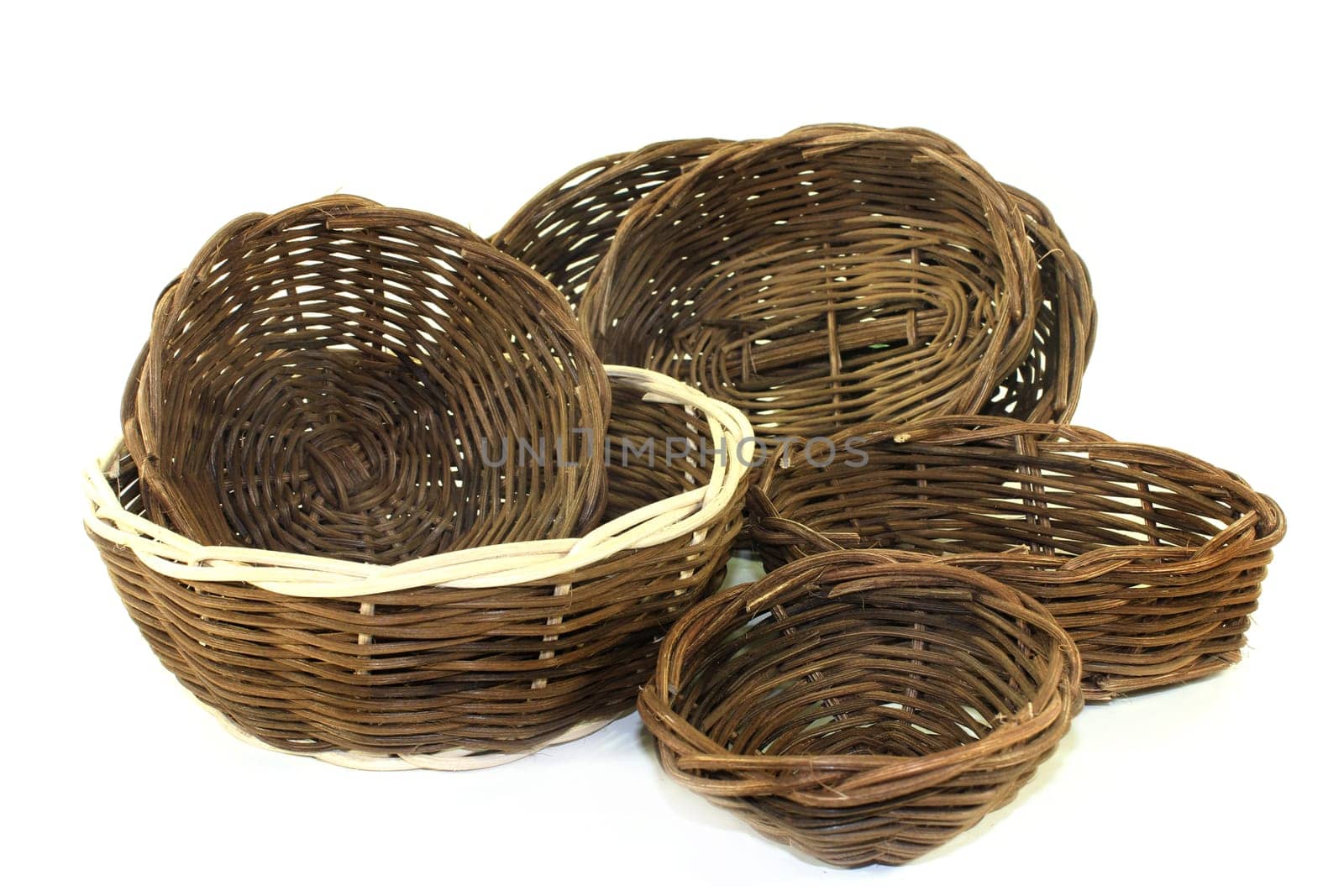 braided willow basket against a bright background