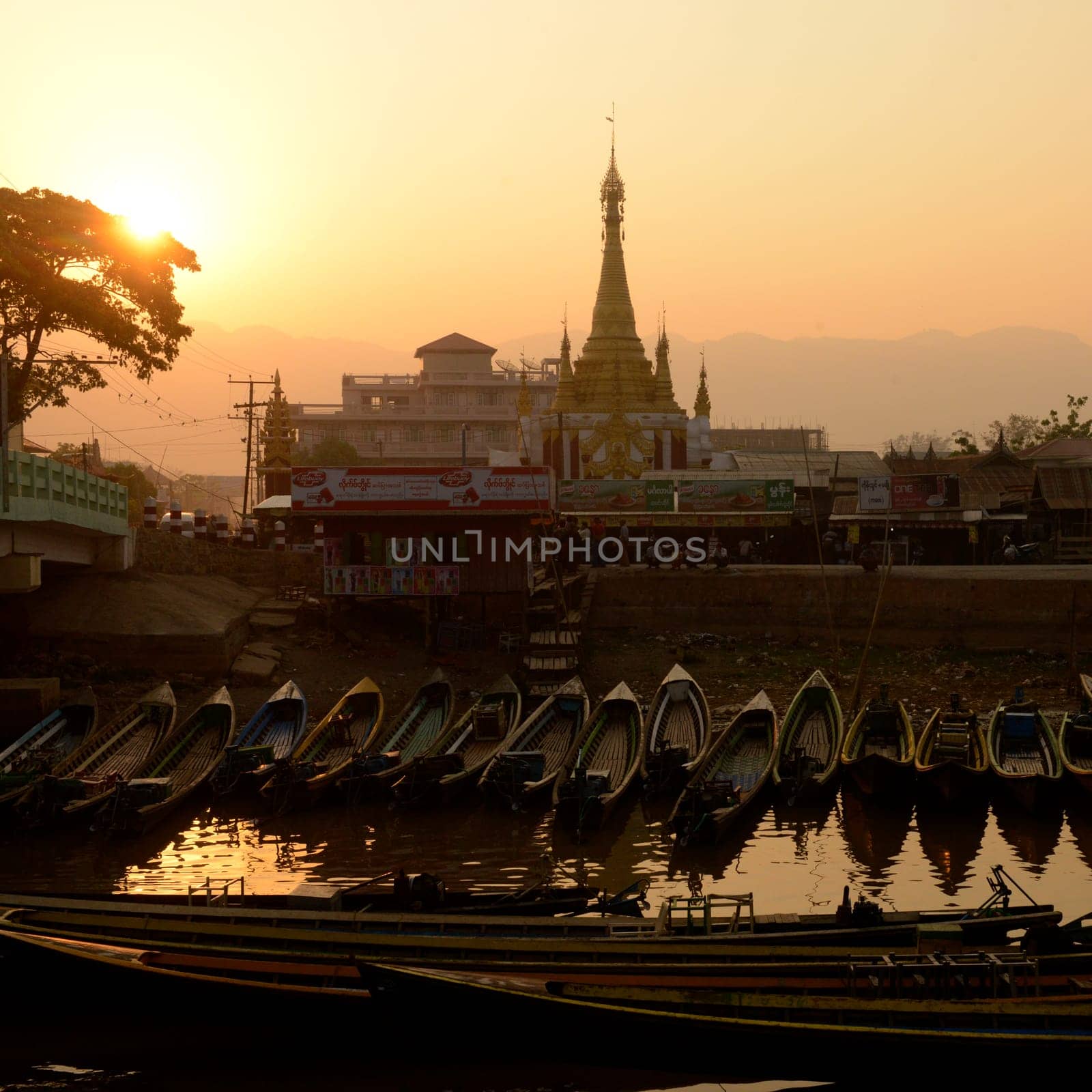 the Boat landing Pier at the Nan Chaung Main Canal in the city of Nyaungshwe at the Inle Lake in the Shan State in the east of Myanmar in Southeastasia.