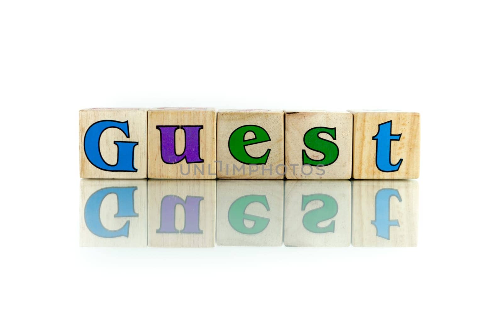 guest colorful wooden word block on the white background