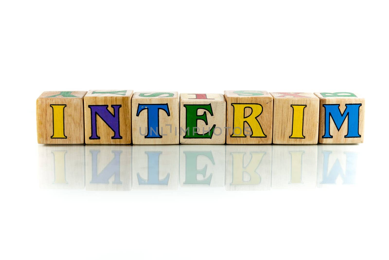 interim colorful wooden word block on the white background