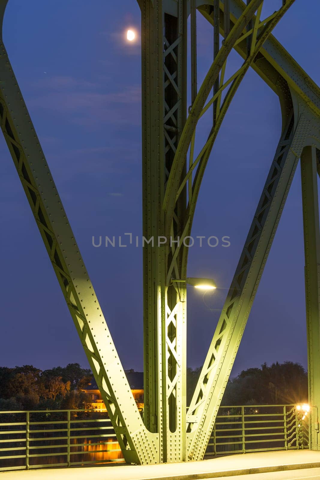 Bridge strut over Glienicker Bridge at full moon